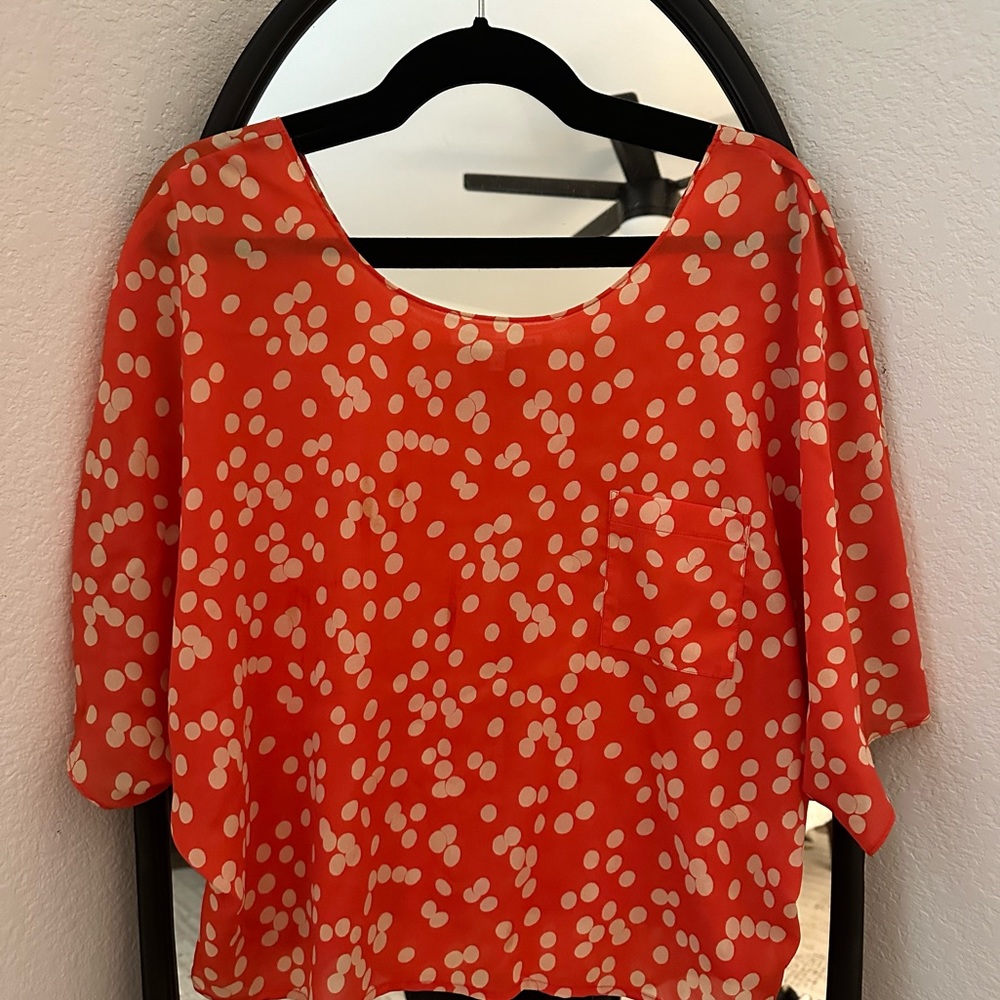 Off the shoulder orange and cream polka dot top